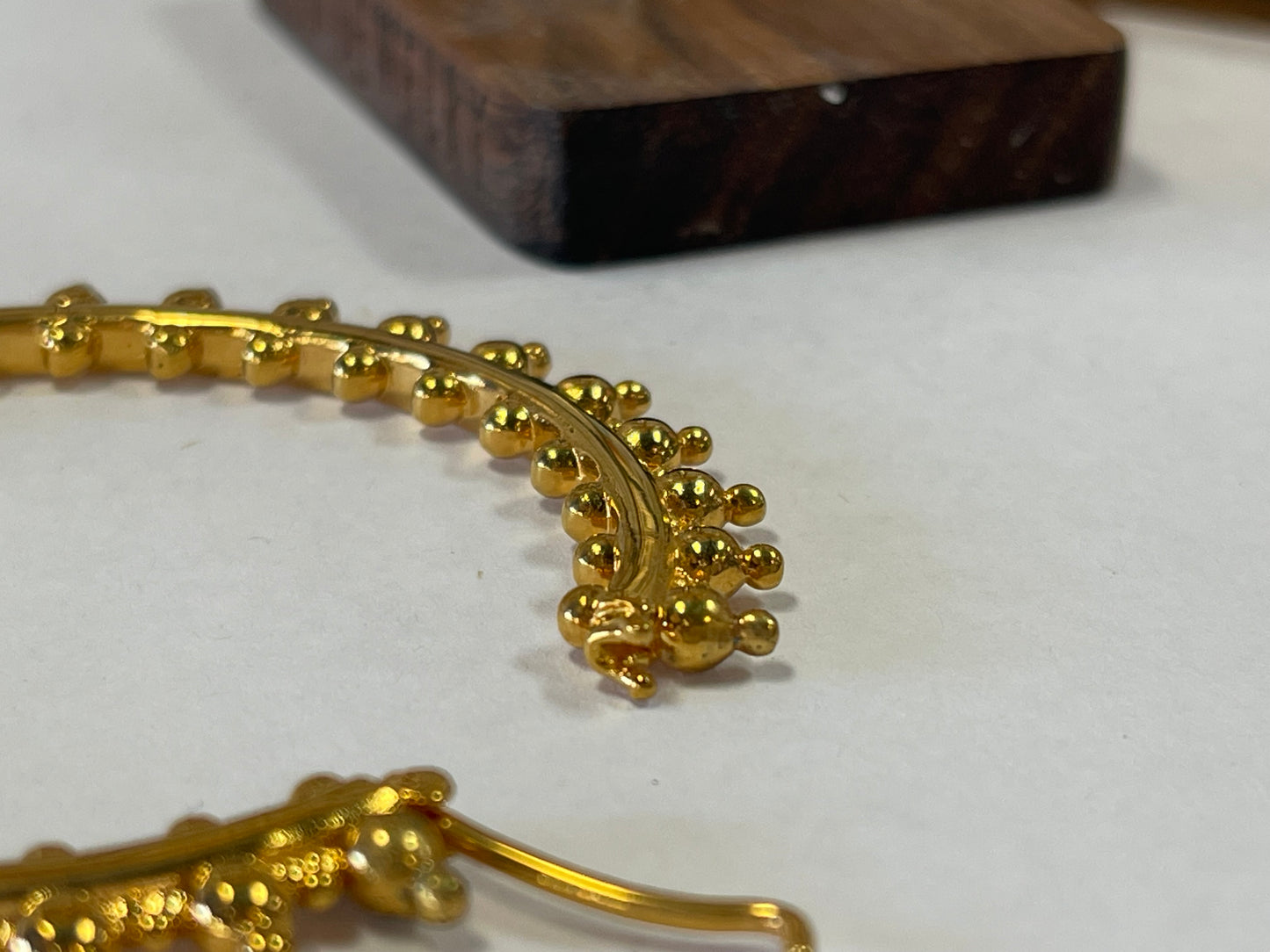 Tectonic earrings from Maya