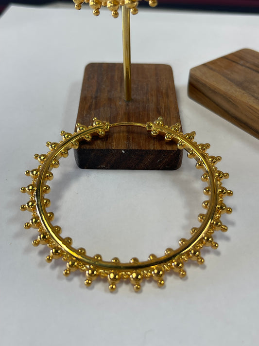 Tectonic earrings from Maya